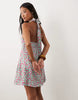 Nobody's Child Petite Lynette deep v halter neck mini dress in blue floral
