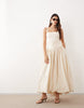ARRANGE premium waisted dress with puffball hem in ecru