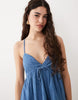 denim v neck mini dress with frill detail in mid blue