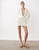 SNDYS premium jersey deep cowl neck flared sleeve mini dress in off-white