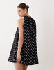 bow detail mini dress in mono polka dot