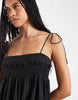 Reclaimed Vintage maxi cami smock dress with bubble hem and bows in black