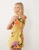 high slash neck mini dress with trim back detail in floral print scuba-style fabric