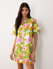 crew neck mini dress with tie sleeve detail in green and pink floral print