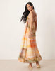 halterneck maxi dress with bead detail in washed sunset print
