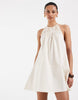 halter neck trapeze shaped waist mini dress in cream