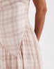 slash neck midi dress with asymmetric hem in cream plaid