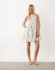 VILA halter neck tiered mini dress in cream floral print