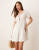 Esmee Exclusive tie front puff sleeve mini beach dress in white ditsy floral