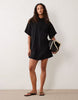 performance fabric relaxed short sleeve mini dress in black