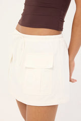 Luck & Trouble Penn Drawcord Mid Rise Mini Skirt White