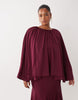 Curve full volume cape maxi dress with godets in berry