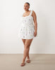 Esmée Curve mini beach dress in white delicate floral