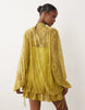 lace mini dress with blouson sleeve and hem detail in green