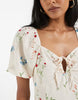 Vero Moda puff sleeve tie front detail maxi dress in cream floral print