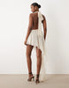 Oh Polly chiffon halter neck asymmetric skirt detail maxi dress in ivory polka dot