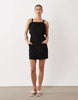 pinny mini dress with pockets and ruffles in black