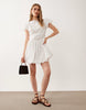 bubble mini dress with cutwork embroidery in white