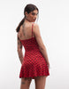 COLLUSION cami skort dress in red polka dots