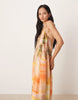 halterneck maxi dress with bead detail in washed sunset print
