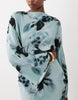 long sleeve tucked waist bias maxi dress in blue blurred floral print