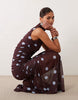 printed polka dot ruched dropped waist circle dress with grown on neck in burgundy