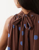 bow detail mini dress in brown and blue spot