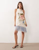 embroidered mini dress with fringe hem in pale pink