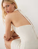 halter neck mini dress in cream