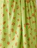 ruched neck mini sundress in green floral print performance fabric