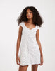 Hollister cap sleeve button up mini dress in white polka dots