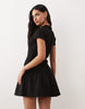 hybrid rib interlock peplum hem mini polo dress in black