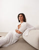 Noughts & Kisses crochet lace cut out detailing bell sleeve maxi dress in cream
