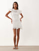 crochet flutter sleeve mini dress in ivory scuba-style fabric