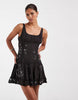 scoop neck mini dress with sheer lace panels and floral embellishment in washed charcoal