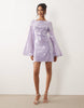 sequin waterfall sleeve mini dress in lilac