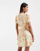 Vero Moda button front detail tea style mini dress in yellow based floral print
