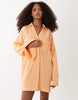 double cloth mini shirt dress with wide cuffs and oversized pockets in orange spritz