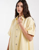 PIECES denim mini shirt dress in pale yellow