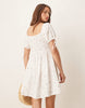 Esmee Exclusive tie front puff sleeve mini beach dress in white ditsy floral