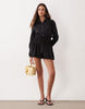 Aria Cove fitted waist detail bubble hem shirt mini dress in black