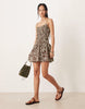 crinkle mini sundress with shirred dropped waist in chocolate shell print