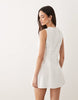 Good American broderie anglaise sleeveless v neck mini dress in white