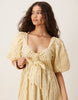 YAS puff sleeve bow front textured midi dress in yellow