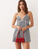 Esmée mini beach dress with contrast piping in black & white gingham