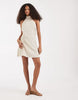 Vero Moda halter neck polka dot mini dress in cream and black