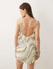 scoop neck mini dress with shaped hem and all over beaded embellishment in Light Green