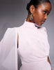 Ruched & Ready sculpting mock neck mesh cape and twisted skirt detailing mini dress in baby pink