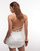 Noughts & Kisses linen blend beaded strap detailing halterneck lace up back mini dress in cream