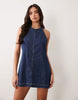 Good American halter neck mini denim dress in dark blue wash